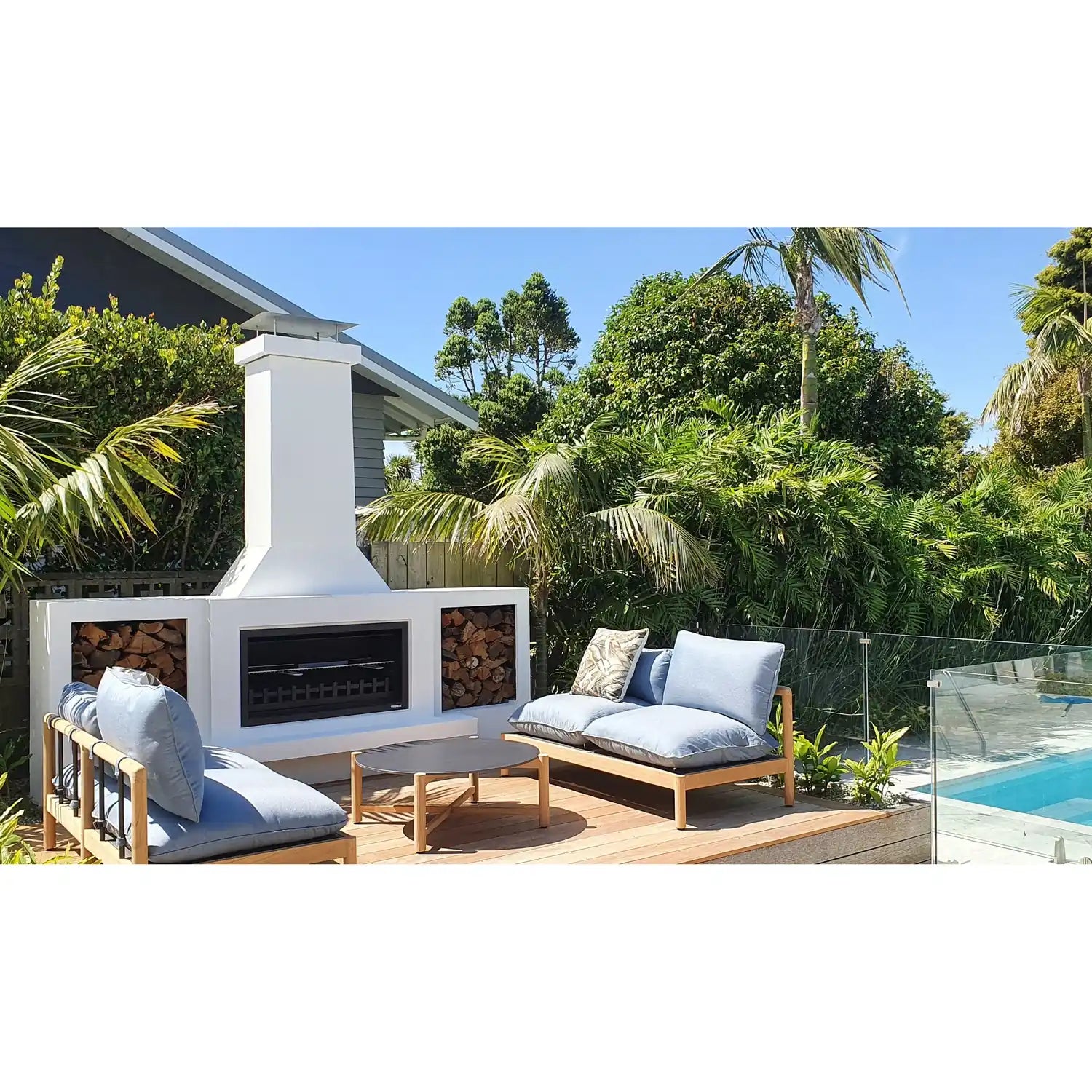 Trendz Douglas Concrete Outdoor Fireplace, plastered white poolside