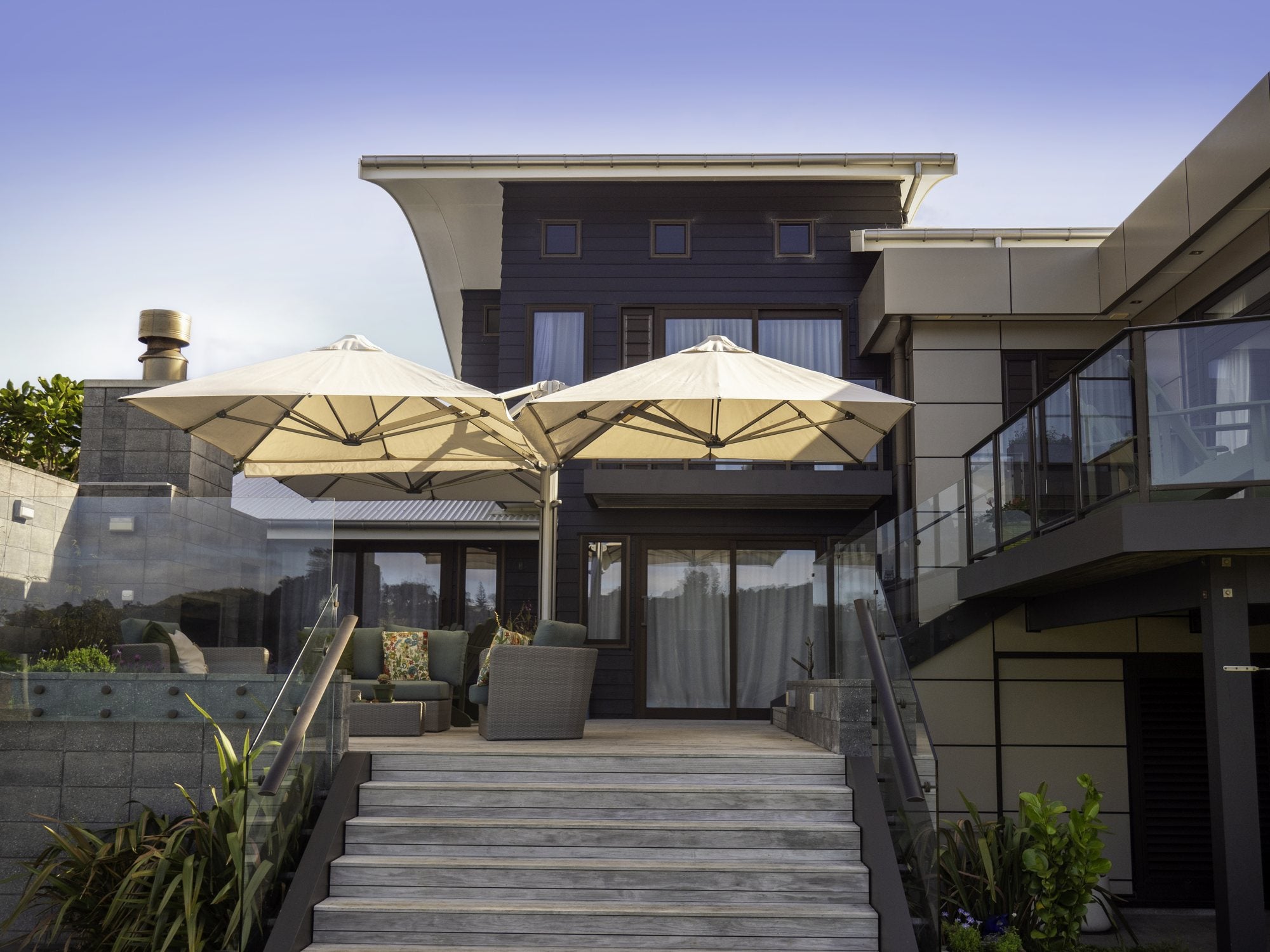 Shadowspec Unity trio umbrella at a modern home