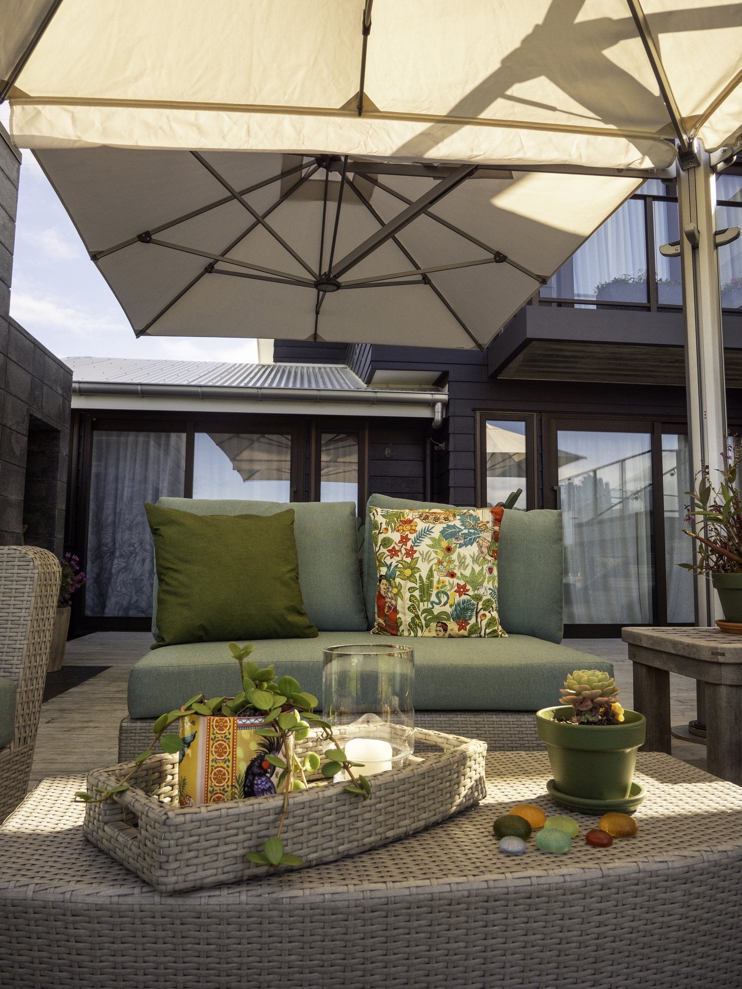 Shadowspec Unity trio umbrella shading an outdoor lounge