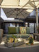 Shadowspec Unity trio umbrella shading an outdoor lounge