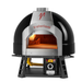 Valoriani Baby F75 gas oven in black on its base, gas hose and control box below the dome
